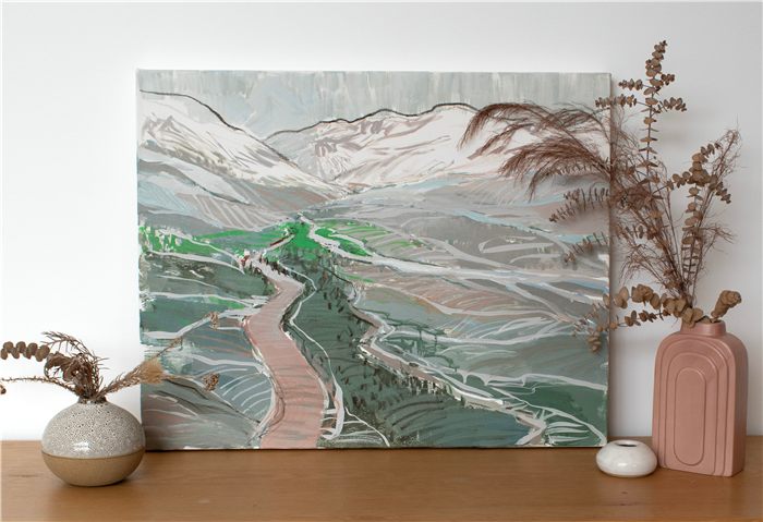 River Path painting by Neli Chaneva on a wooden console table